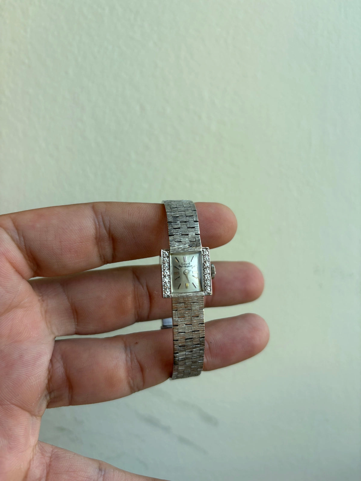 Girard Perregaux silver Dial on integrated brick